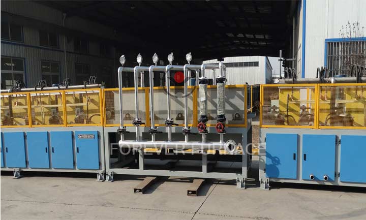 Long bar induction hardening and tempering machine